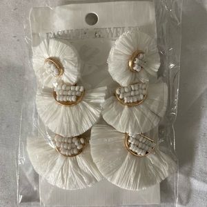 White dangling earrings